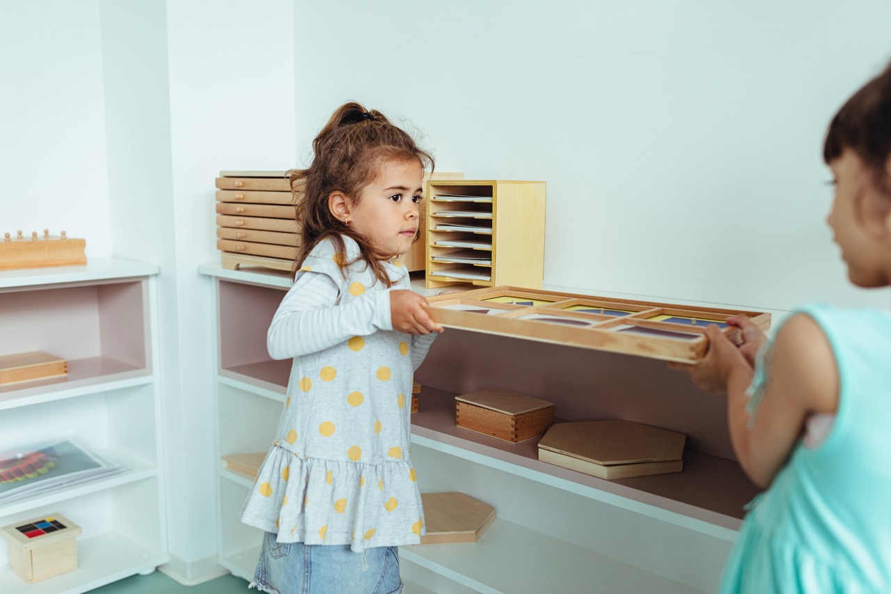 Children being creative together in a Montessori environment